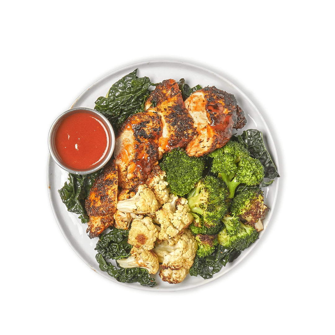 blackened chicken, roasted broccoli, cauliflower, steamed tuscan kale, buffalo sauce azuluna foods premium pasture raised ready to eat meal